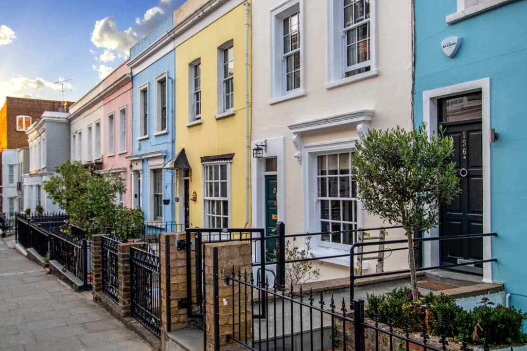 A row of colourful terrace houses in the Notting Hill area of London