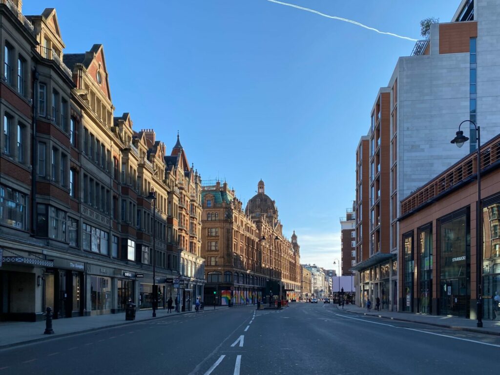A street in the Knightsbridge area of London, with apartments along a high street, Quintessentially Estates can offer buying and letting opportunities.